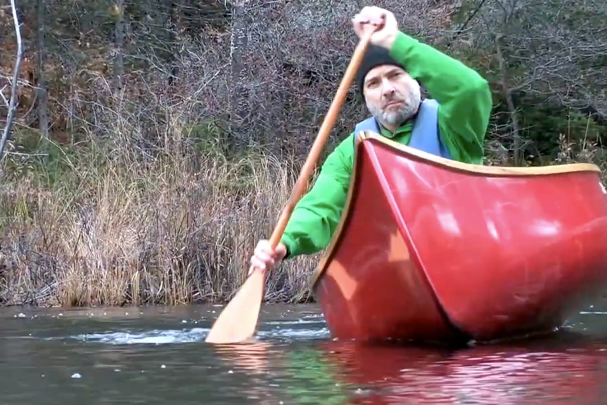 Canoe instructor Francis Boyes demonstrates the start to the J-stroke by initiating a forward stroke.