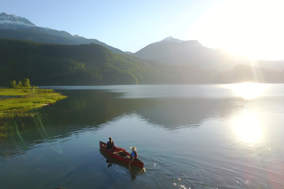 Learning how to canoe opens opportunities like paddling across a lake in tandem.