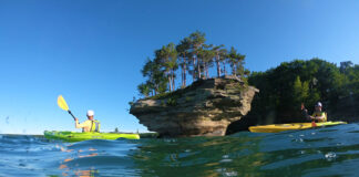 two people paddling in Evoke kayaks that cost under $1,000