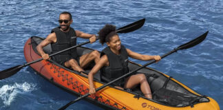 two people paddle the Tobin Sports Wavebreak