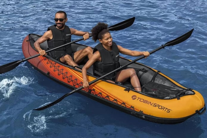 two people paddle the Tobin Sports Wavebreak