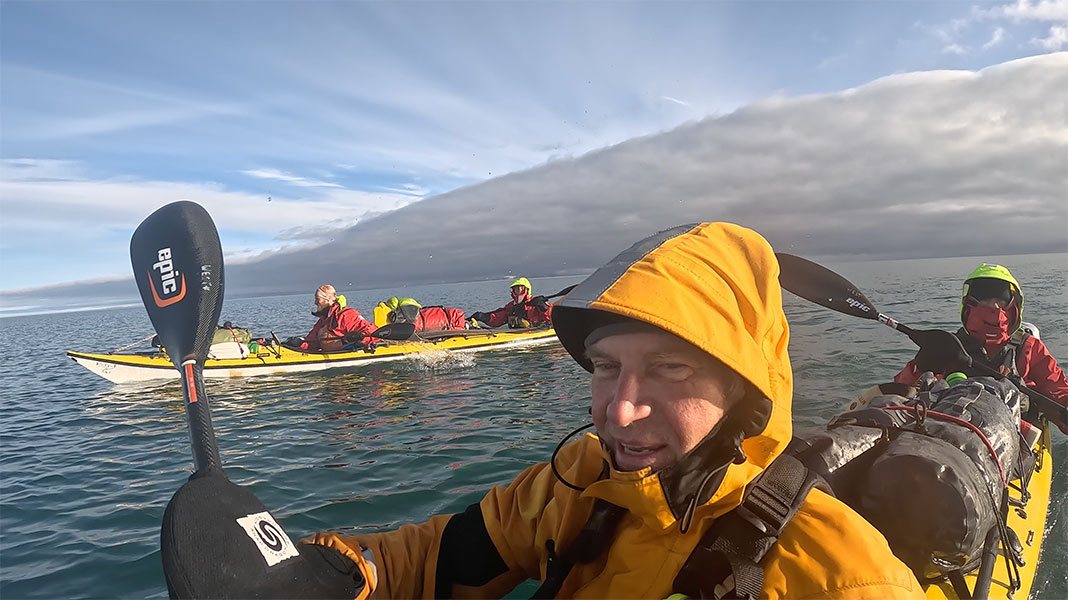 a brief sunny spell as the Arctic Cowboys paddle their kayaks through the Northwest Passage