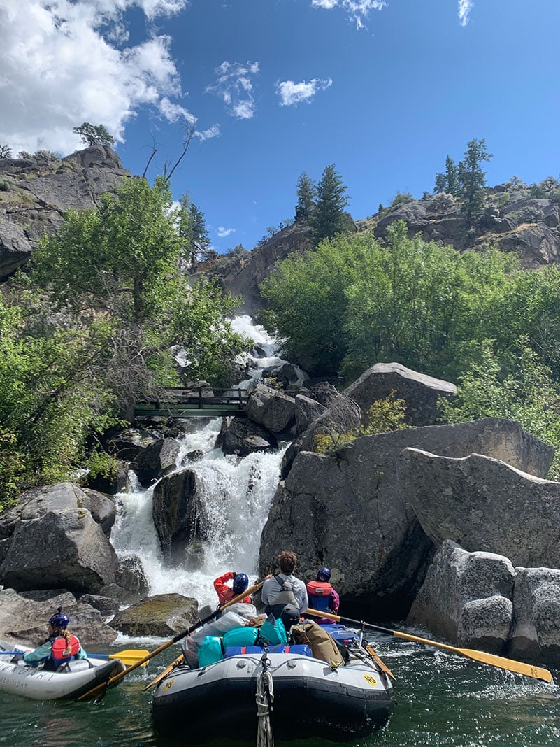 rafters look up a rocky waterfall on the Salmon River