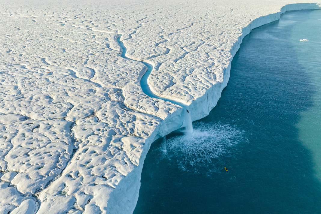 Aniol Serrasolses paddles 65-foot waterfall off a glacier.