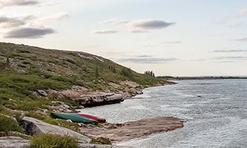 canoes beached on the banks of the Thelon River