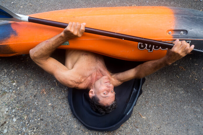 Dan Dixon showing roll technique on dry land.