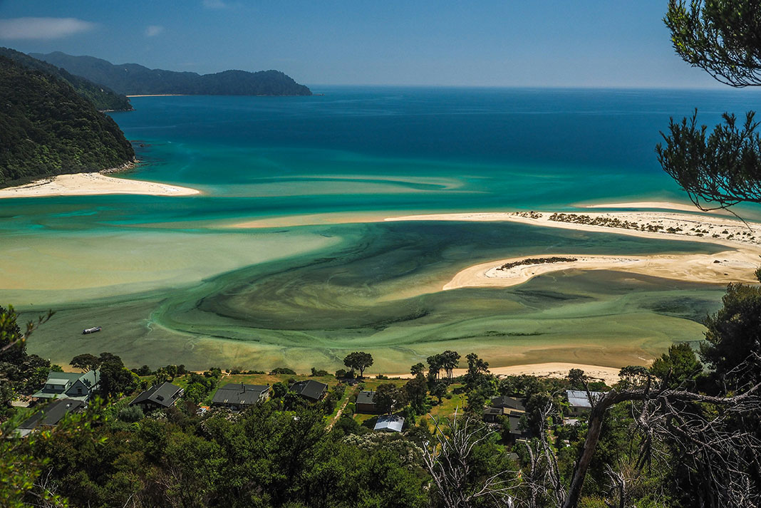 colourful waters of Abel Tasman National Park in New Zealand