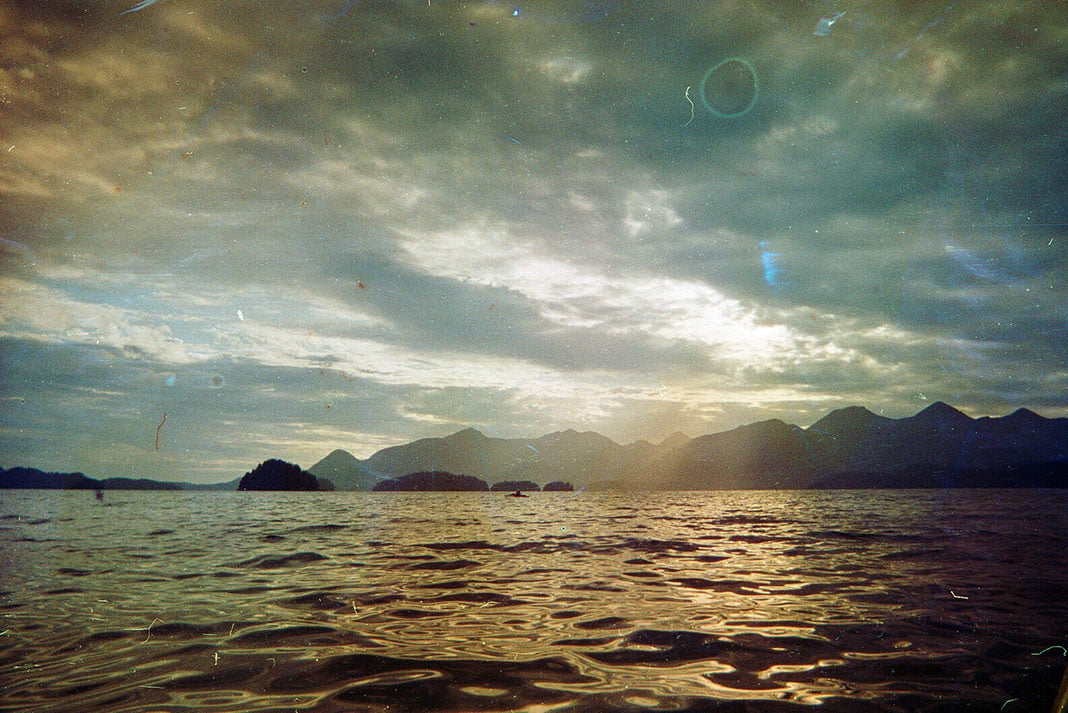 moody photo of the Salish Sea with water damage