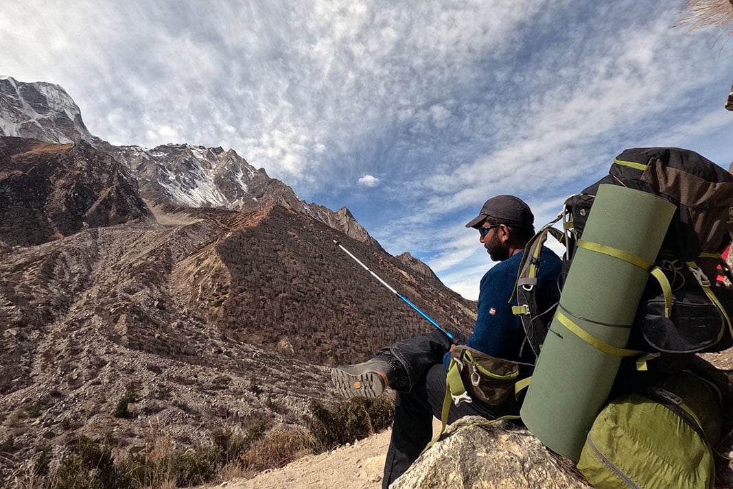 a view of mountain peak in India while Rency Thomas is hiking with large pack