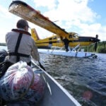 Park wardens fly out a sleeping bag filled with rotting garbage from Algonquin Park’s backcountry, left by campers who require remedial education
