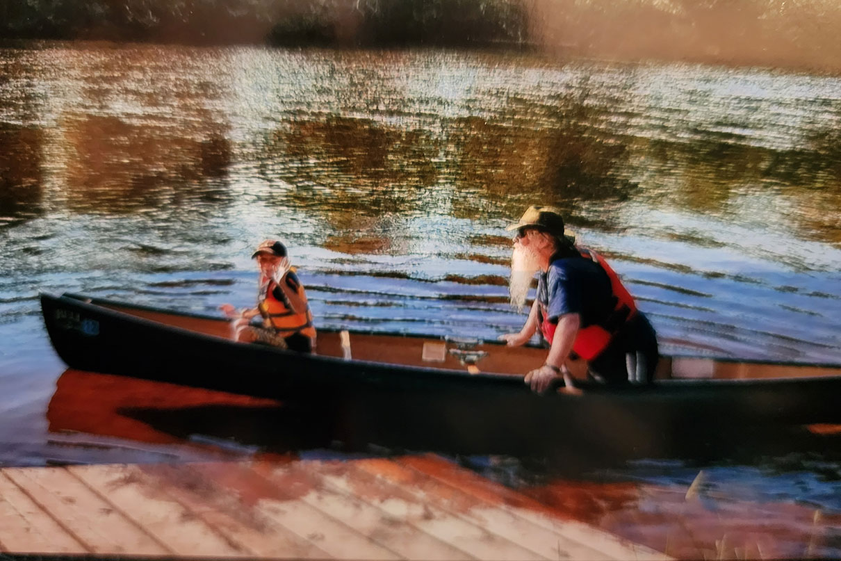 Dan Cooke canoeing with his daughter