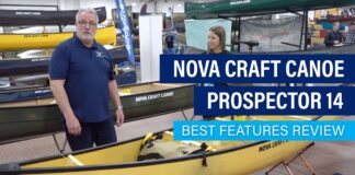 people stand beside the Nova Craft Prospector 14 at Canoecopia