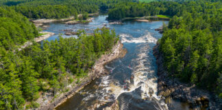 overhead view of people paddling through rapids on the Ottawa River