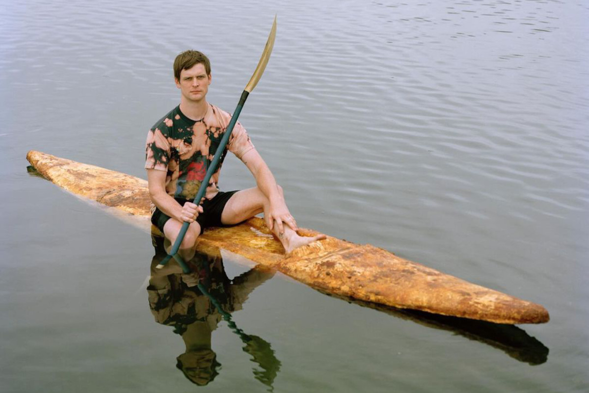 Sam Shoemaker with fungi kayak.