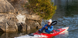 woman paddling the Norse Kayaks Ask touring kayak