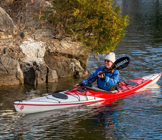 woman paddling the Norse Kayaks Ask touring kayak