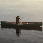 Review: Nova Craft Canoe Prospector 14 Woman paddles the Nova Craft Canoe Prospector 14 solo canoe.