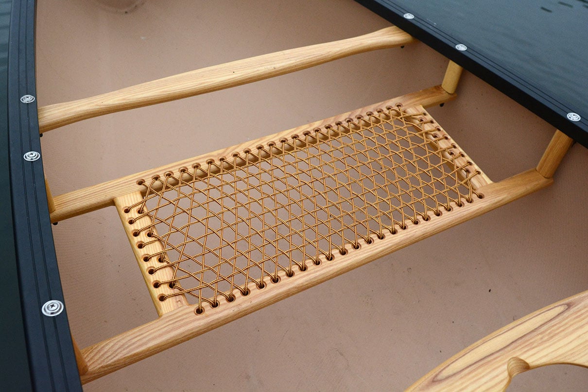 detail photo of traditional ash and lace seat on the Nova Craft Prospector 14 canoe