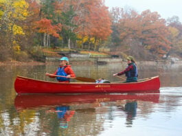 two women paddle the Rheaume Canoes Explorer 16