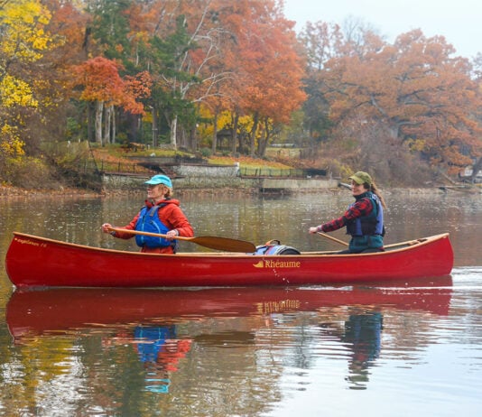 two women paddle the Rheaume Canoes Explorer 16