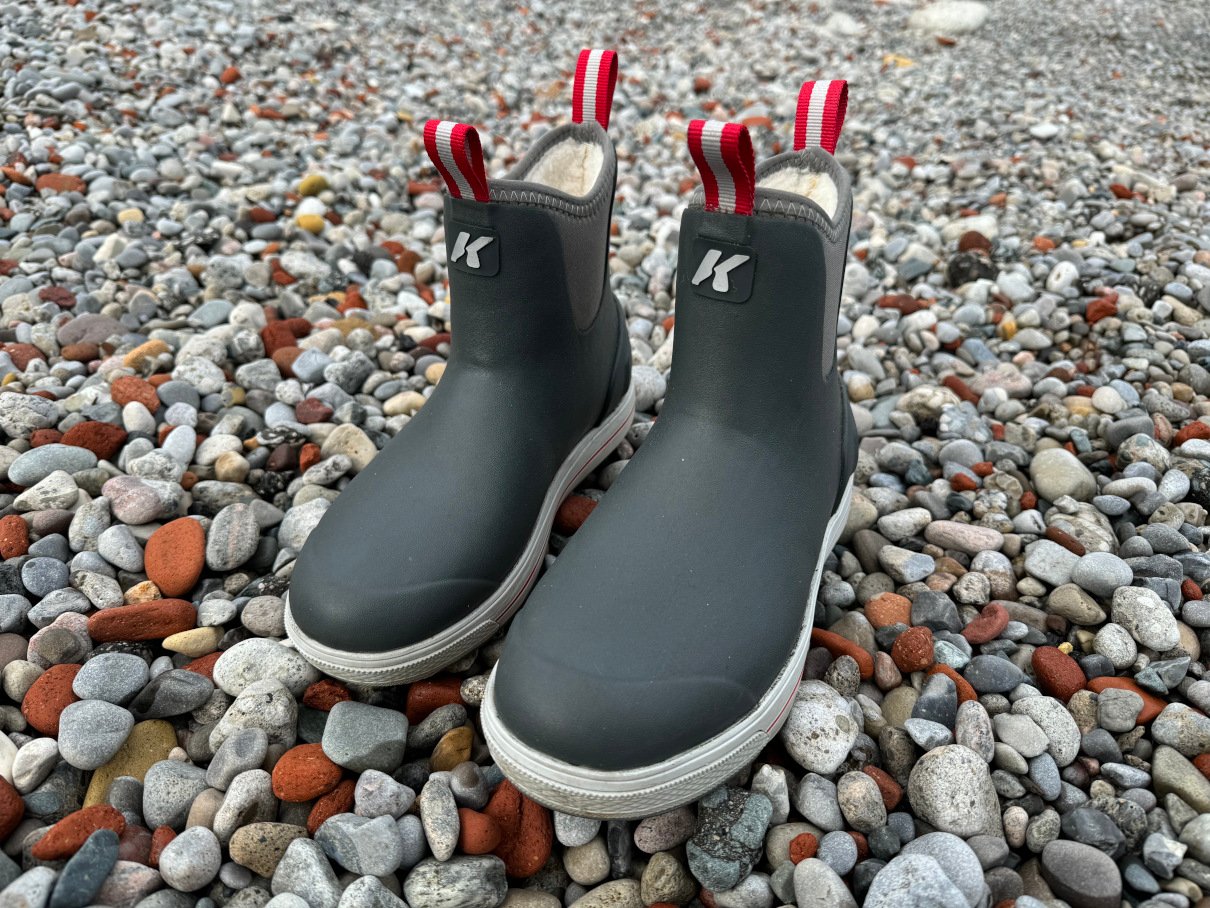 Korkers neoprene boots on rocks.