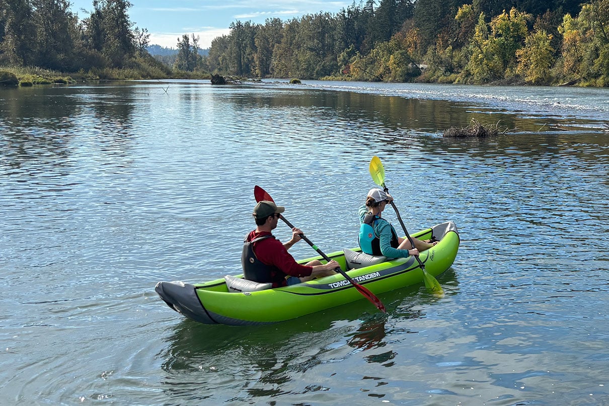 Joe Potoczak paddles the AIRE Tributary Tomcat Tandem inflatable kayak with partner