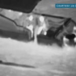 Hawaii Teen Rescued After Night At Sea Clinging to Kayak (Video) still from footage of rescue of teen kayaker offshore in Hawaii