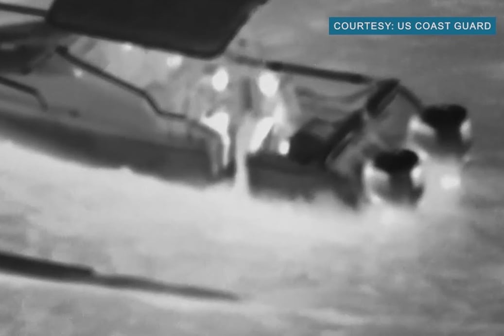 still from footage of rescue of teen kayaker offshore in Hawaii