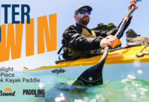 Kayaker paddling a kayak using the tetra Ultralight 2-piece Posi-Lok Kayak Paddle