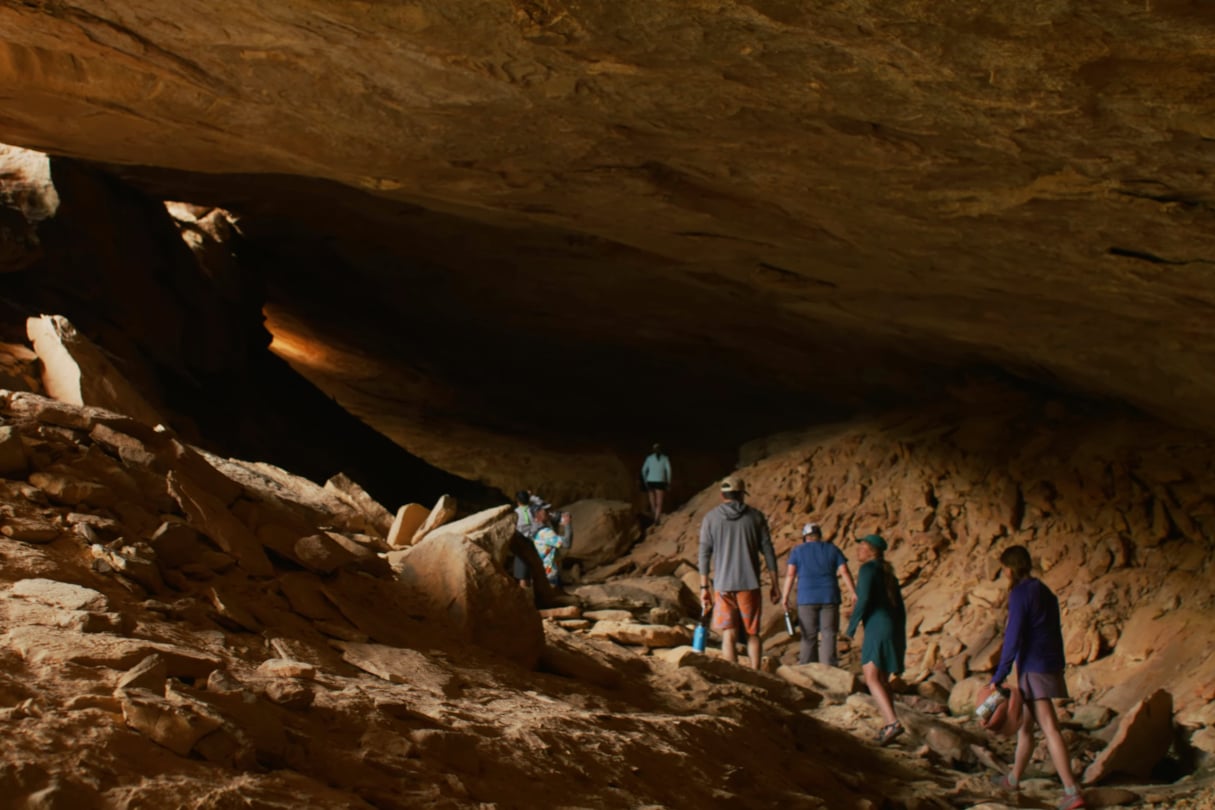 Hiking through cavern.