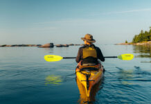 Kayaker with a low-angle paddle on Georgian Bay