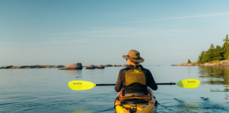 Kayaker with a low-angle paddle on Georgian Bay