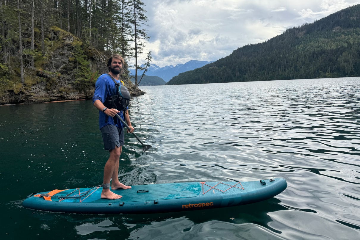 man paddles the Retrospec Weekender Tour paddleboard