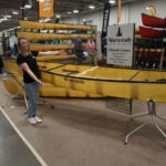 The Wenonah Minnesota II in superlight at Canoecopia 2025. Feature Image: Joe Potoczak.